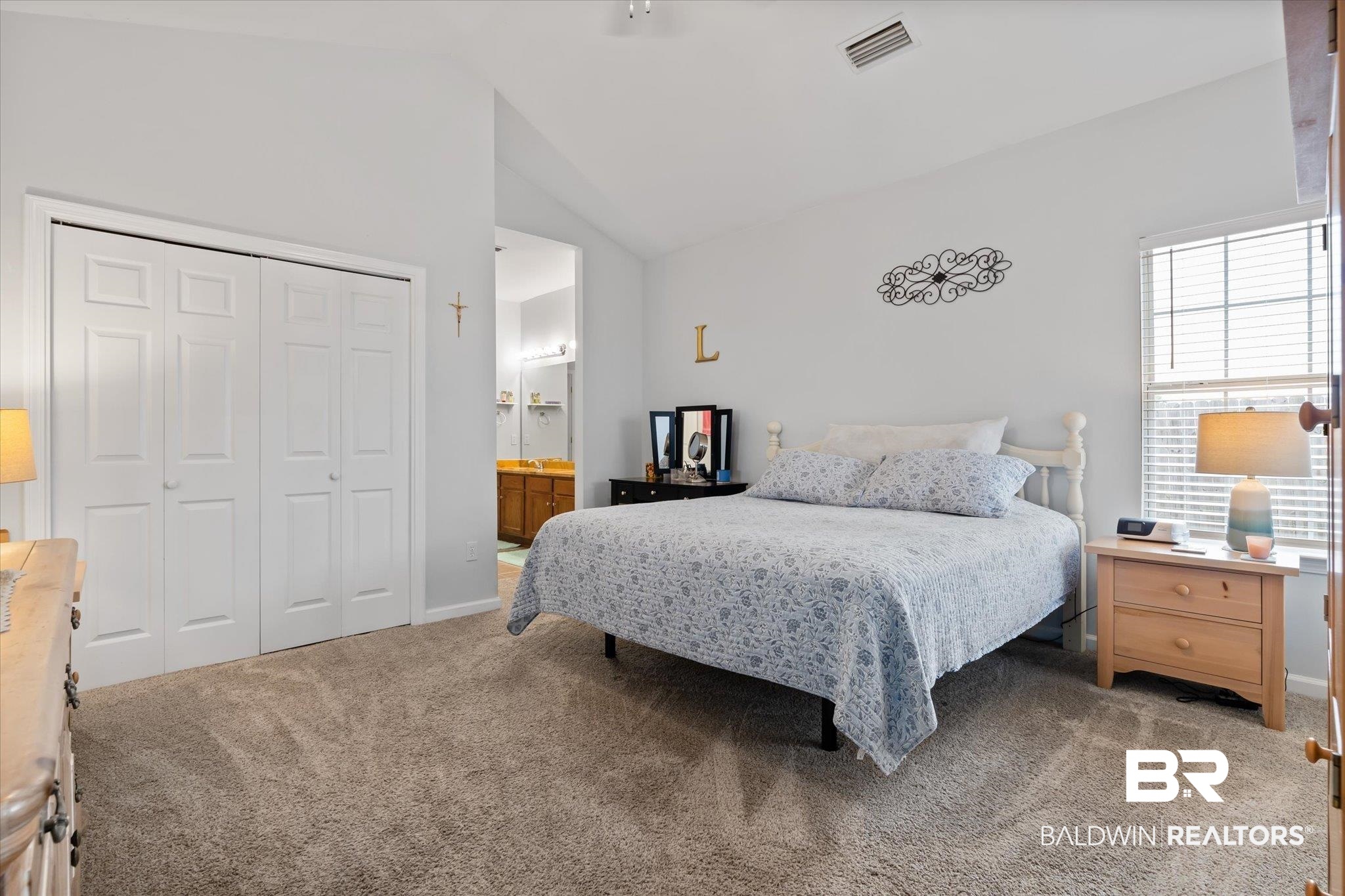 3876 Emerille Drive Foley, AL 36535 - Photo 13 of 31 Bedroom featuring carpet, ensuite bath, vaulted ceiling, and a closet