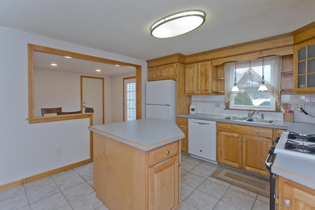 380 Tinkham Road Springfield, MA 01129 - Photo 13 of 42 a kitchen that has a sink cabinets counter space and appliances