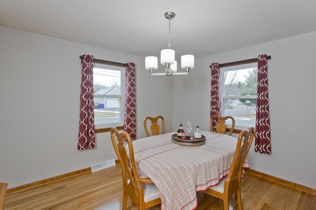380 Tinkham Road Springfield, MA 01129 - Photo 14 of 42 a view of a dining room with furniture window and wooden floor