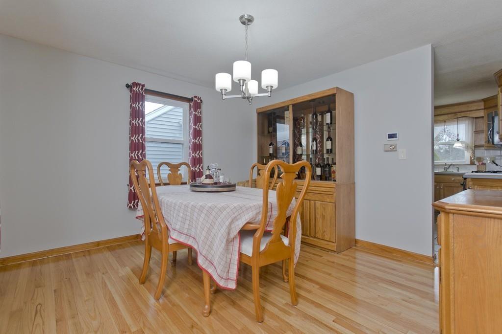 380 Tinkham Road Springfield, MA 01129 - Photo 15 of 42 a view of a dining room with furniture and wooden floor