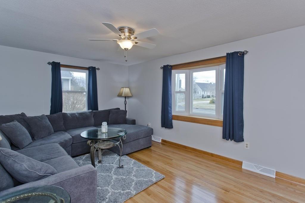 380 Tinkham Road Springfield, MA 01129 - Photo 18 of 42 a living room with furniture and a wooden floor