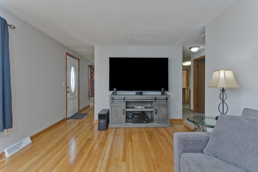 380 Tinkham Road Springfield, MA 01129 - Photo 20 of 42 a living room with furniture and a flat screen tv
