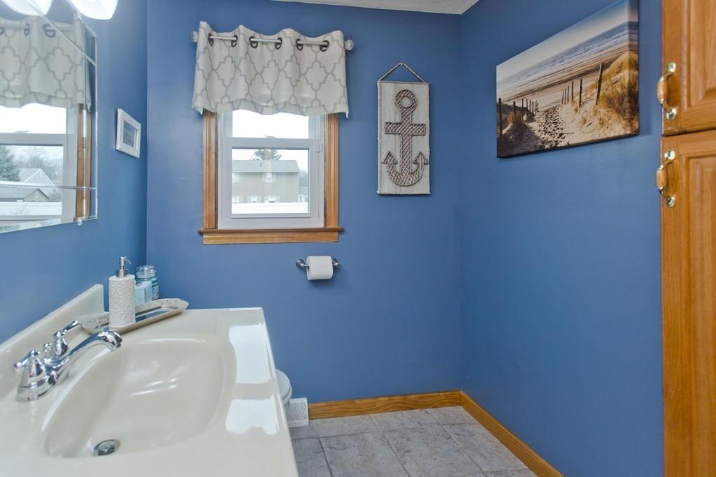 380 Tinkham Road Springfield, MA 01129 - Photo 23 of 42 a bathroom with a sink and a window