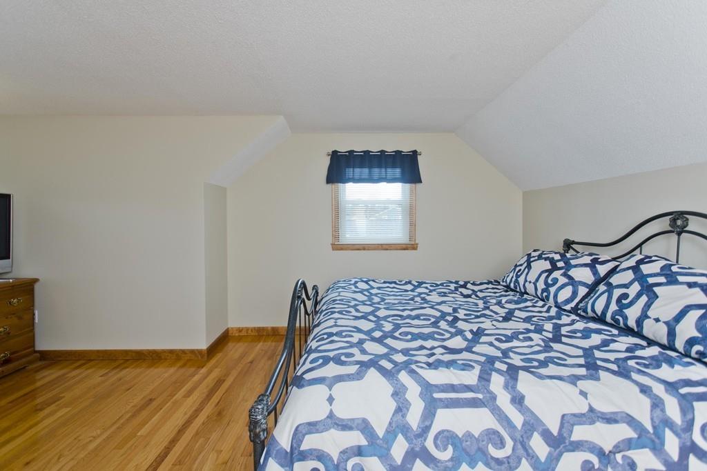 380 Tinkham Road Springfield, MA 01129 - Photo 26 of 42 a bedroom with a bed and a window