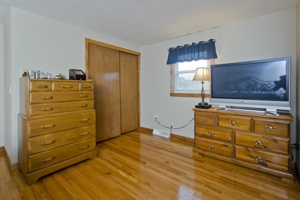 380 Tinkham Road Springfield, MA 01129 - Photo 27 of 42 a room with dresser and flat screen tv