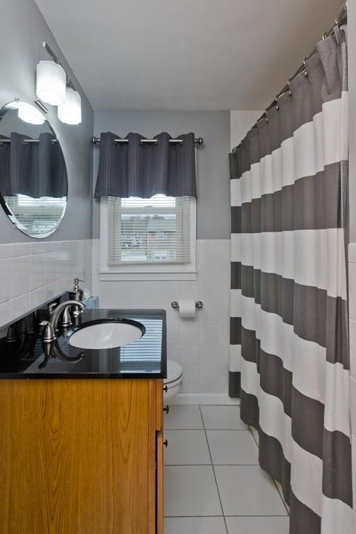 380 Tinkham Road Springfield, MA 01129 - Photo 29 of 42 a bathroom with a sink and a mirror