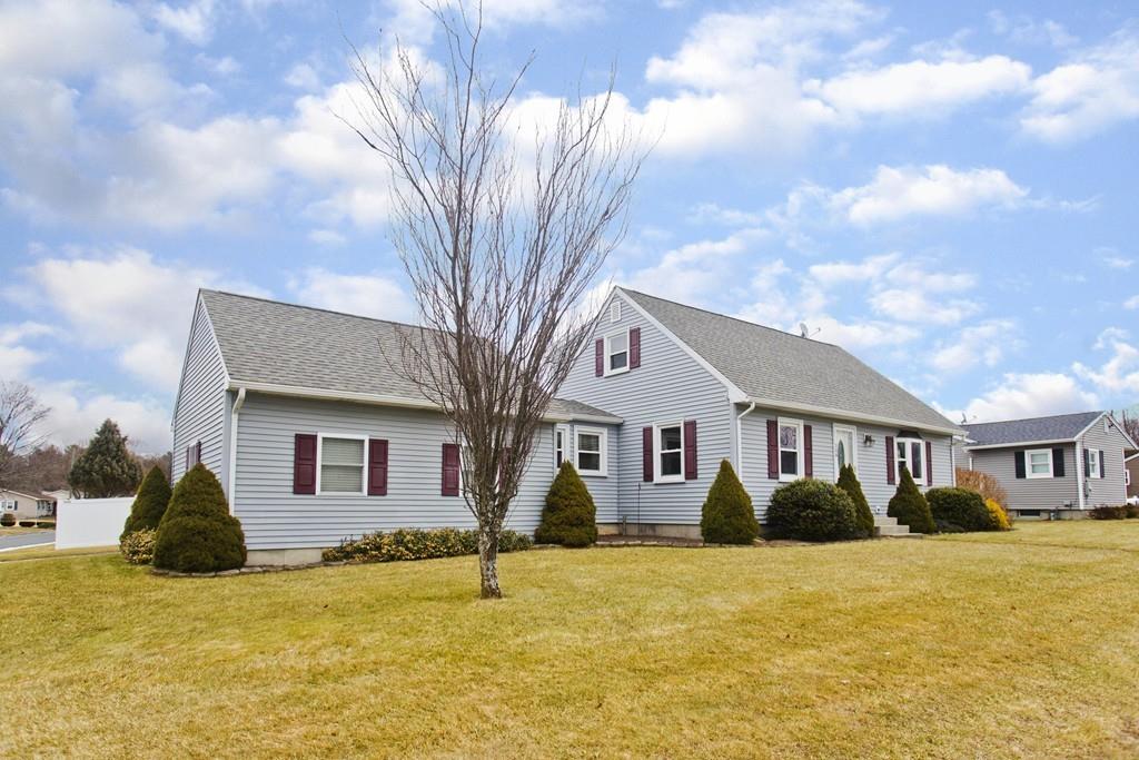 380 Tinkham Road Springfield, MA 01129 - Photo 3 of 42 a front view of a house with yard and garage