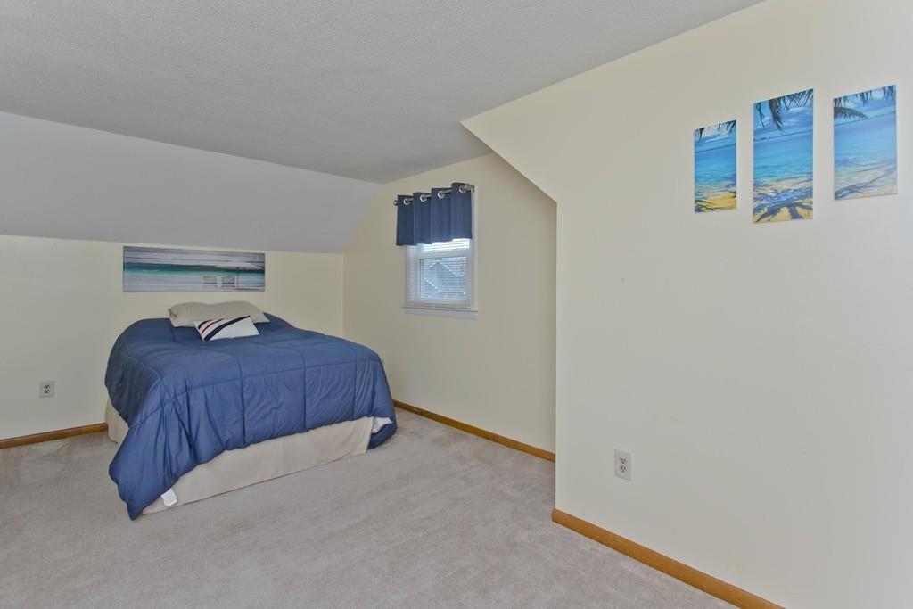 380 Tinkham Road Springfield, MA 01129 - Photo 31 of 42 a bedroom with a bed and hallway