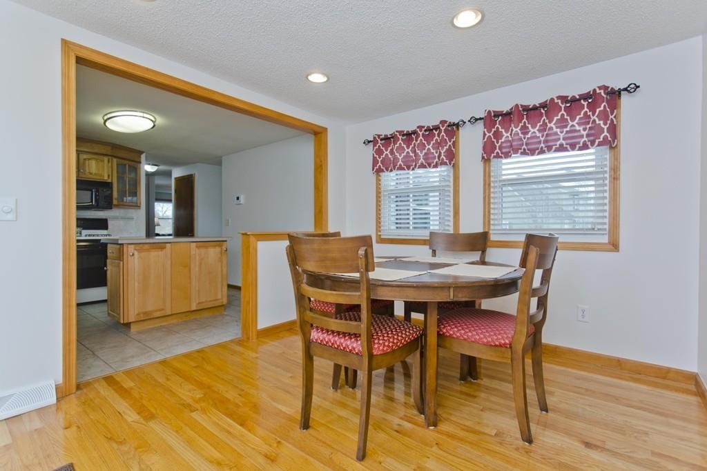 380 Tinkham Road Springfield, MA 01129 - Photo 6 of 42 a view of a dining room with furniture and wooden floor