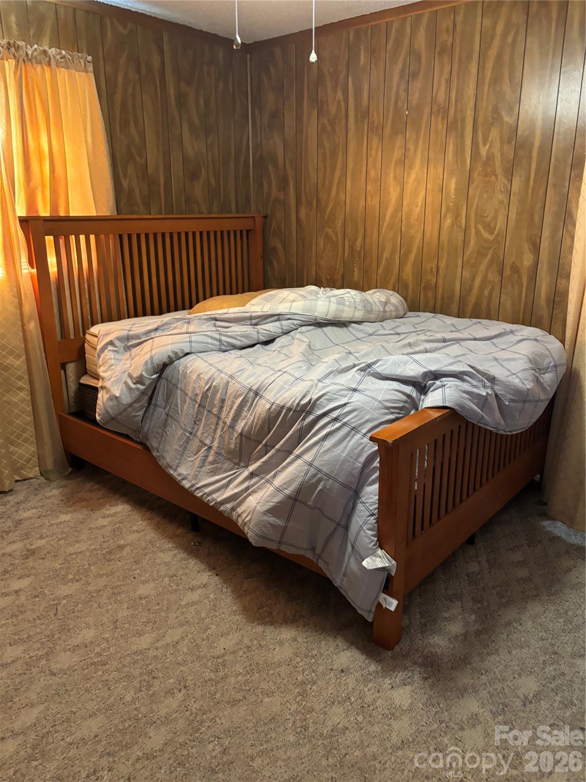 7 Post Oak Place Salisbury, NC 28147 - Photo 12 of 17 a bedroom with a bed and wooden floor