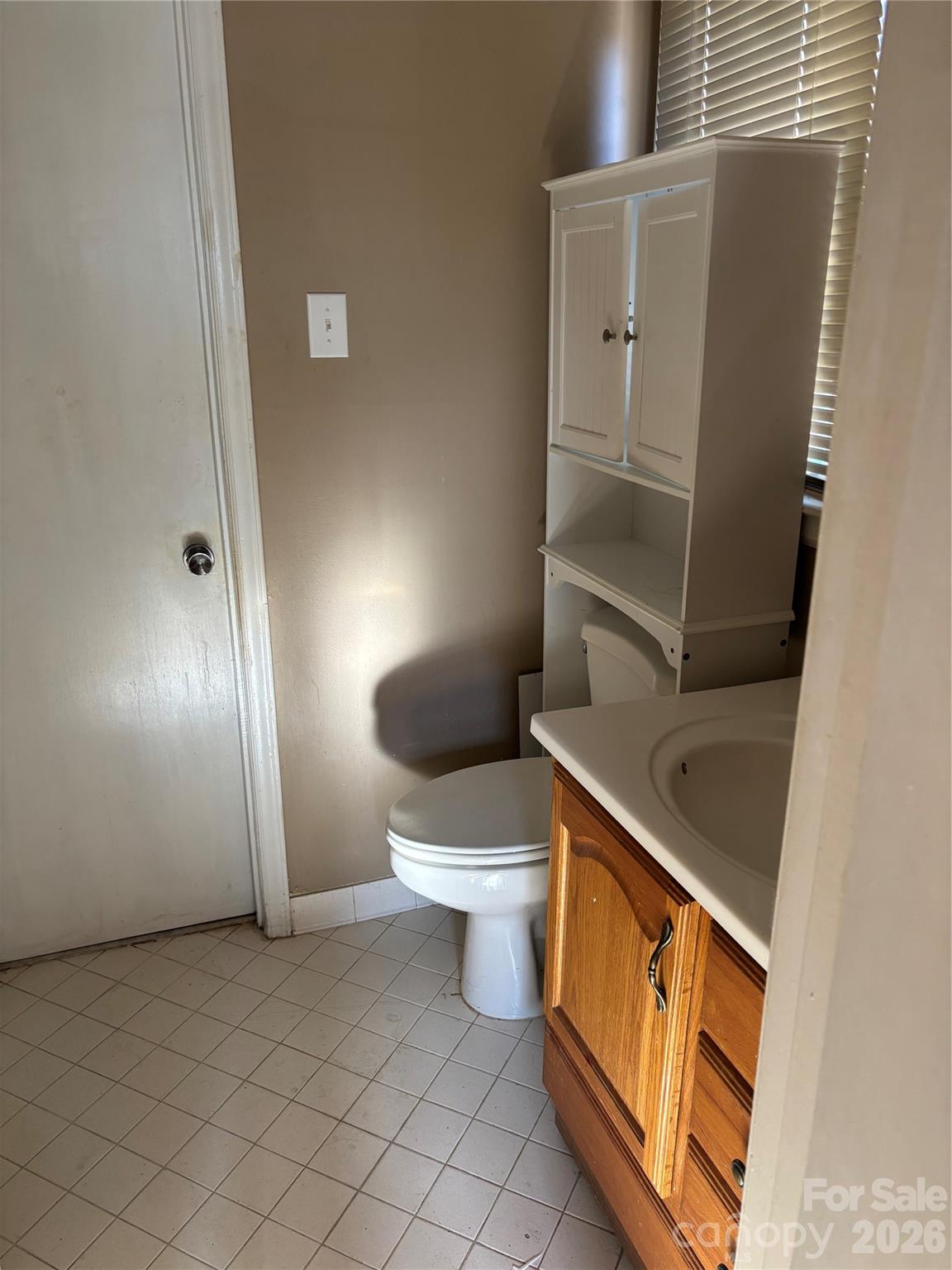 7 Post Oak Place Salisbury, NC 28147 - Photo 15 of 17 a bathroom with a toilet sink and mirror