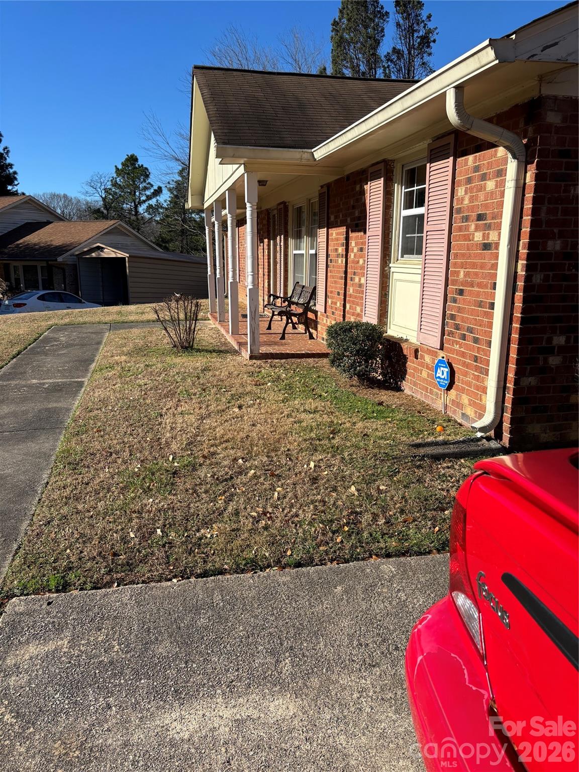 7 Post Oak Place Salisbury, NC 28147 - Photo 3 of 17 a view of a house with a floor to ceiling window and potted plants