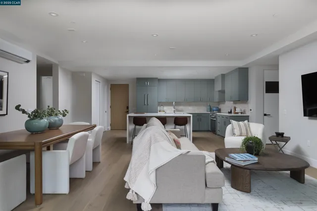 a living room with furniture and a table