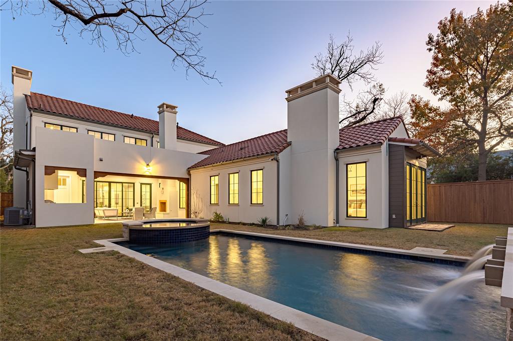 4509 Pomona Road Dallas, TX 75209 - Photo 17 of 17 a view of a house with a swimming pool