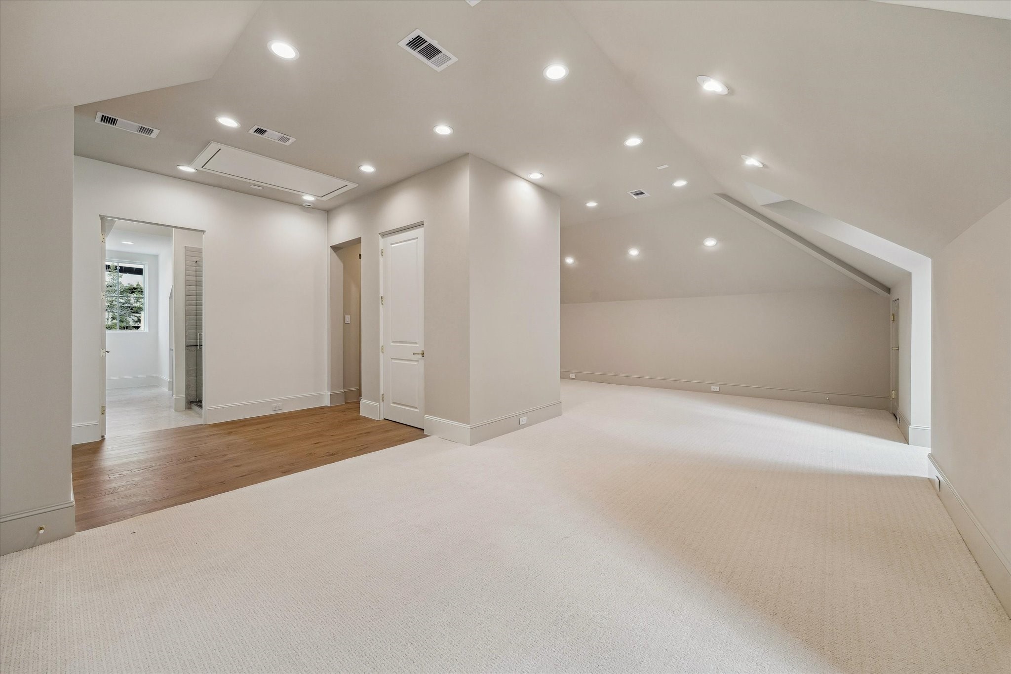 25 Wentworth Gate Path Houston, TX 77027 - Photo 27 of 32 As you enter the third floor, you are greeted by a generously-sized gameroom with access to a full bath, and an additional bedroom space.