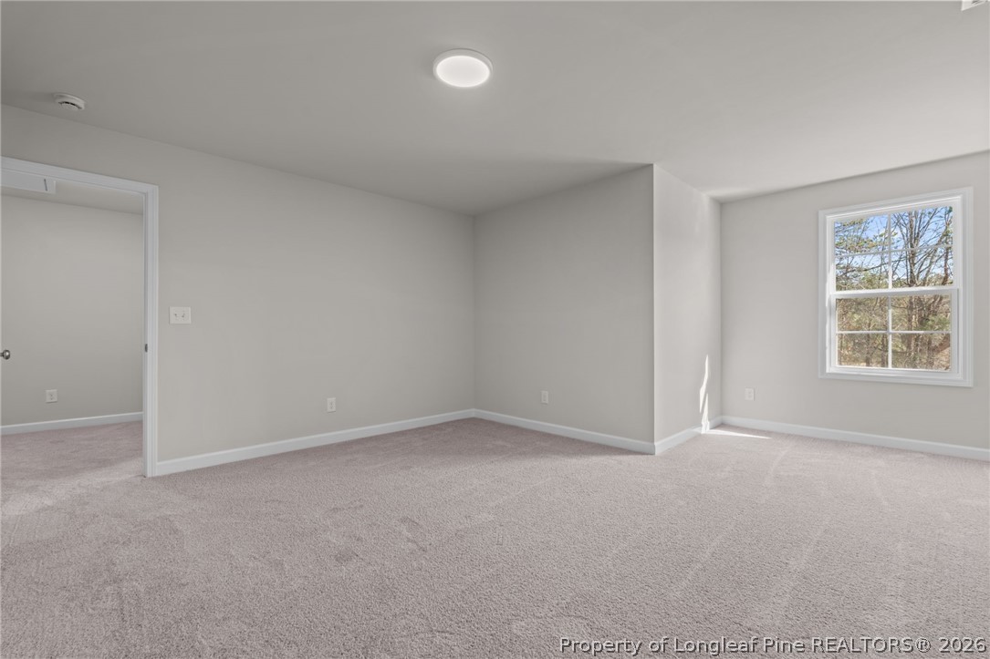 302 Elijah Way Vass, NC 28394 - Photo 17 of 44 an empty room with a window