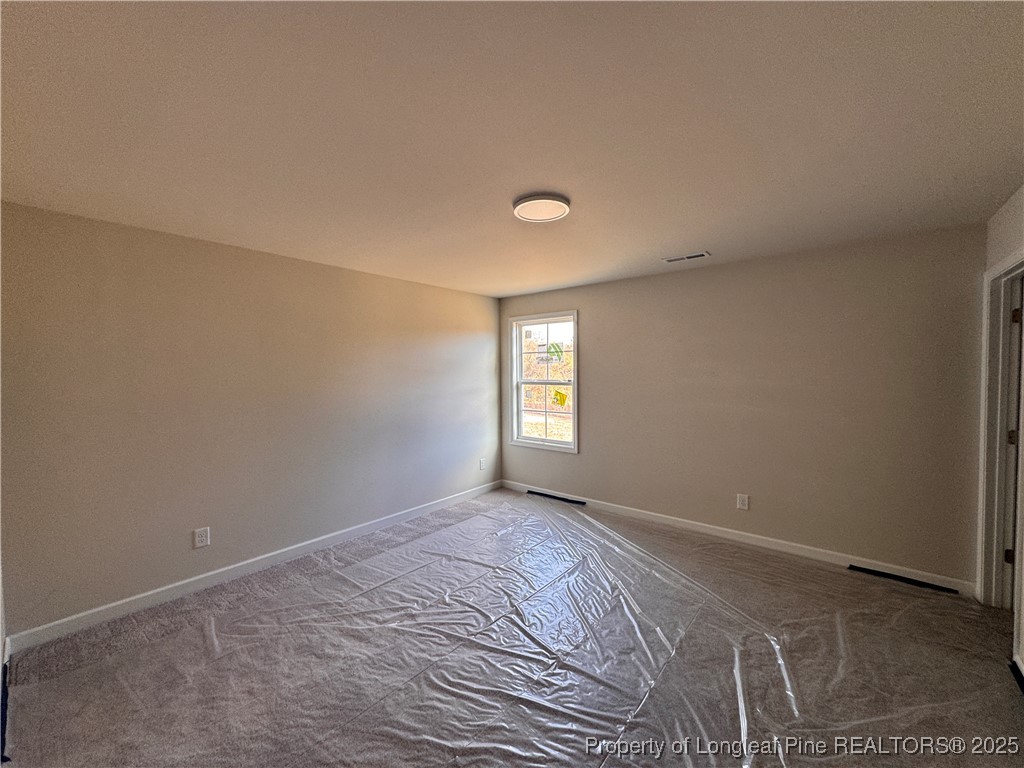 302 Elijah Way Vass, NC 28394 - Photo 21 of 28 a view of empty room with window