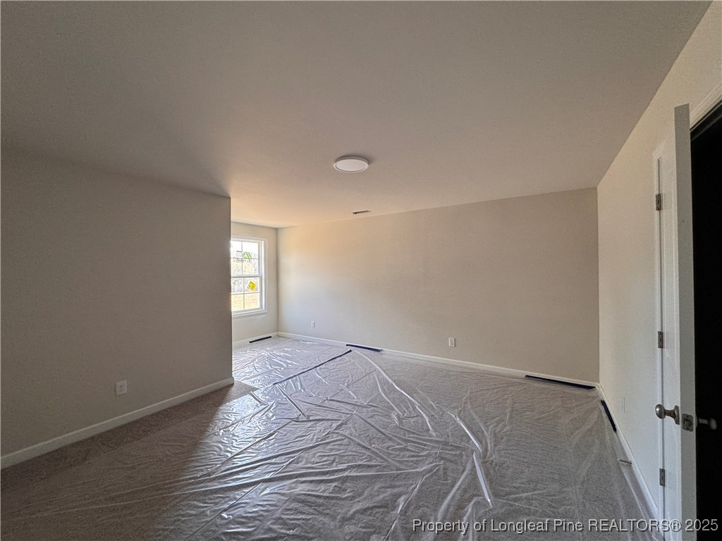 302 Elijah Way Vass, NC 28394 - Photo 22 of 28 a view of an empty room