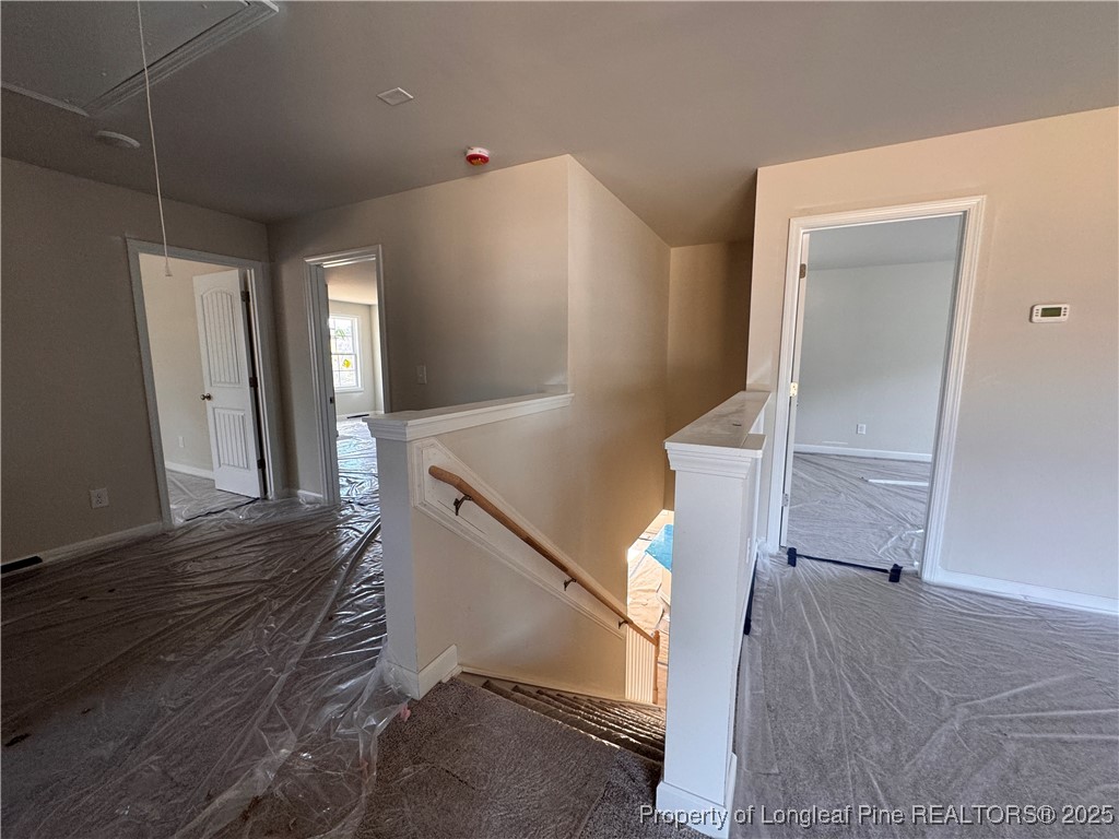 302 Elijah Way Vass, NC 28394 - Photo 24 of 28 a view of a living room with furniture and wooden floor