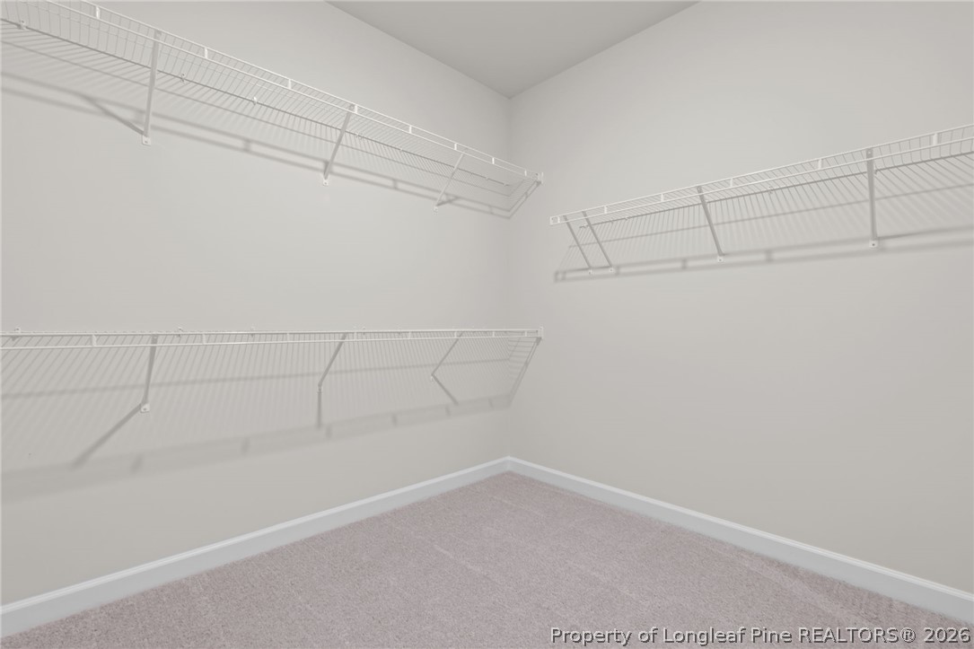 302 Elijah Way Vass, NC 28394 - Photo 26 of 44 a view of a room with racks on the wall