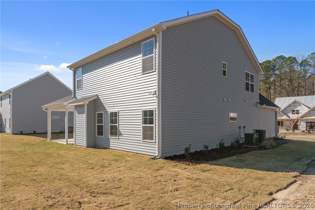 302 Elijah Way Vass, NC 28394 - Photo 41 of 44 a view of a house with a yard
