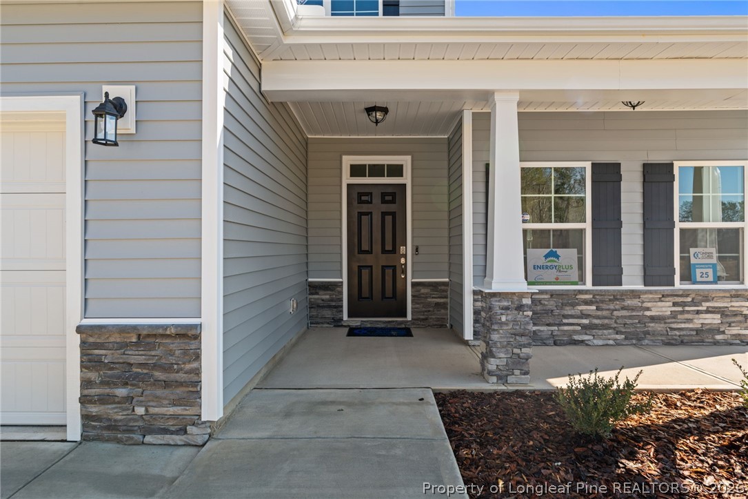 302 Elijah Way Vass, NC 28394 - Photo 6 of 44 a view of entrance door of the house