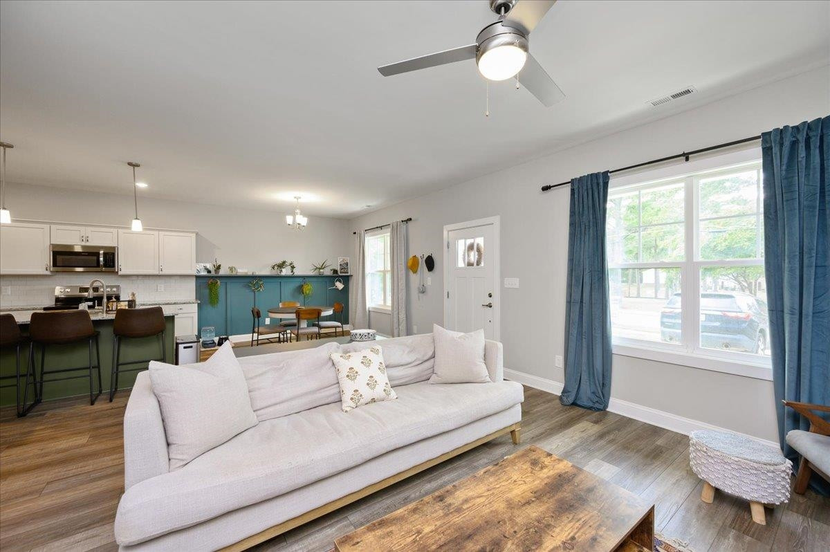 212 North Allen Road Wake Forest, NC 27587 - Photo 11 of 28 a living room with furniture and a large window