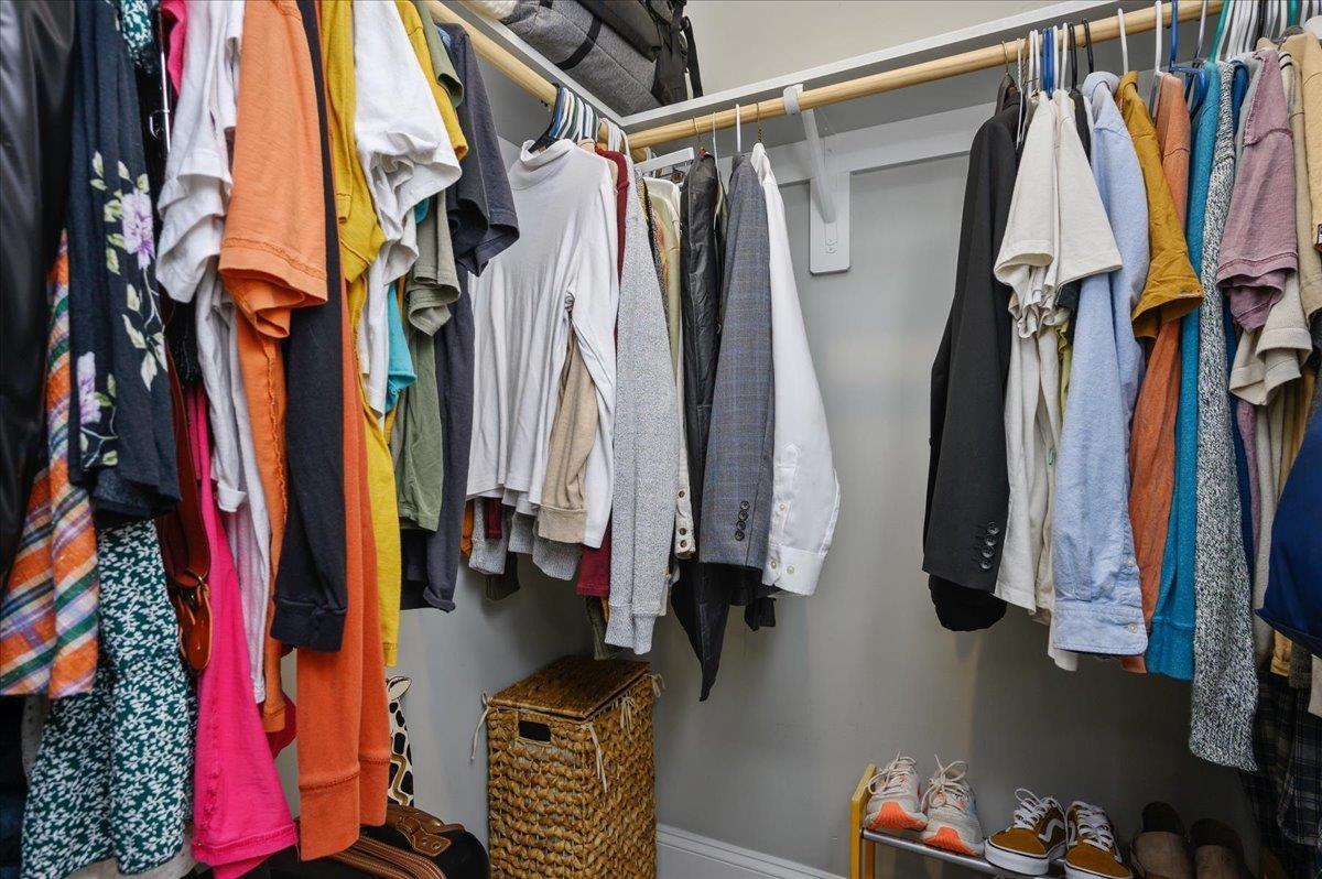 212 North Allen Road Wake Forest, NC 27587 - Photo 26 of 28 a view of walk in closet with clothes and shoes