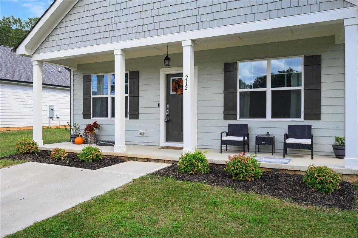 212 North Allen Road Wake Forest, NC 27587 - Photo 28 of 28 a front view of a house with garden