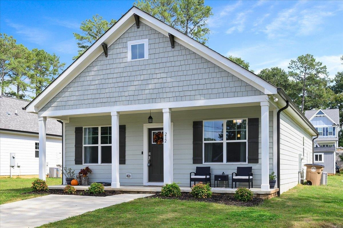 212 North Allen Road Wake Forest, NC 27587 - Photo 3 of 28 a front view of house with yard and green space