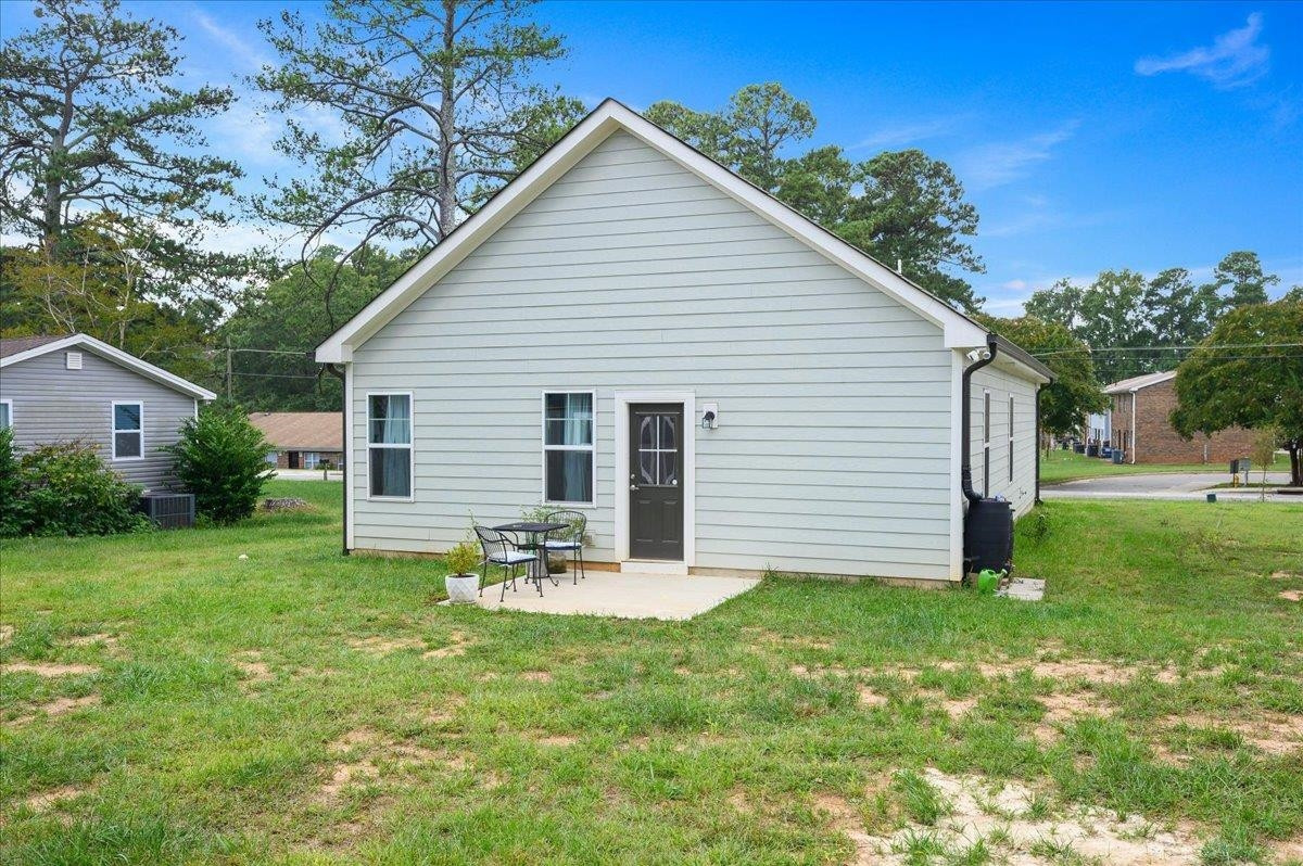 212 North Allen Road Wake Forest, NC 27587 - Photo 4 of 28 a front view of house with yard and outdoor seating