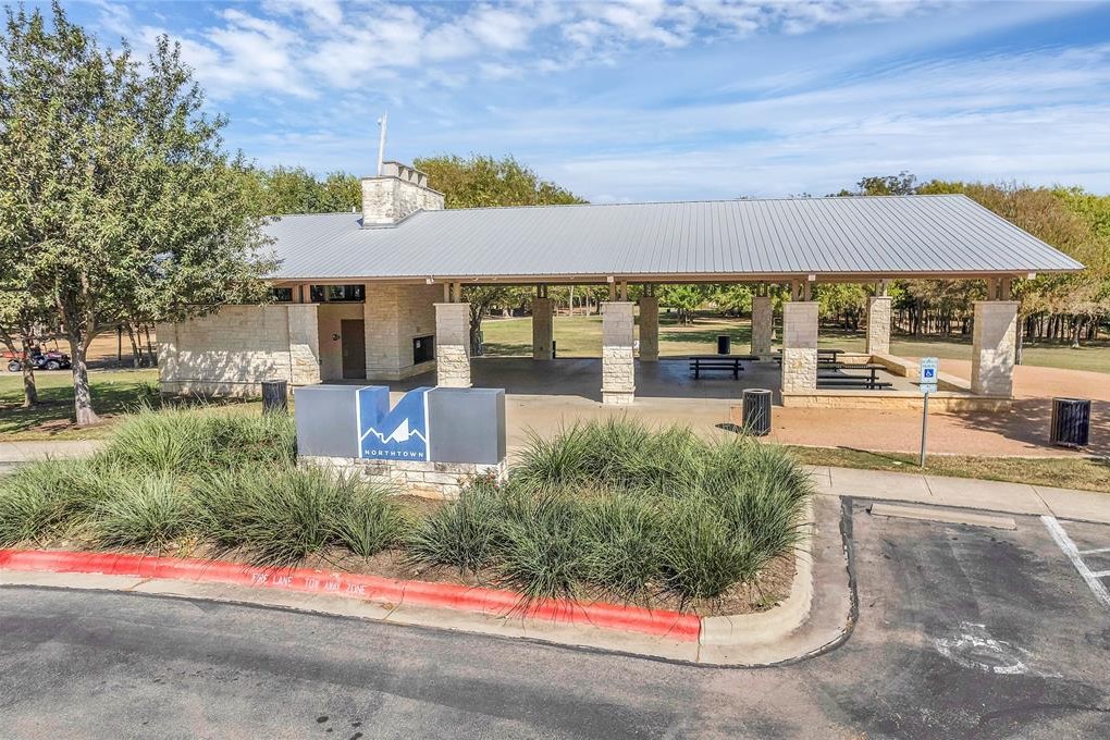 809 Sebastian Bend, Unit B Pflugerville, TX 78660 - Photo 30 of 34 front view of house with a yard