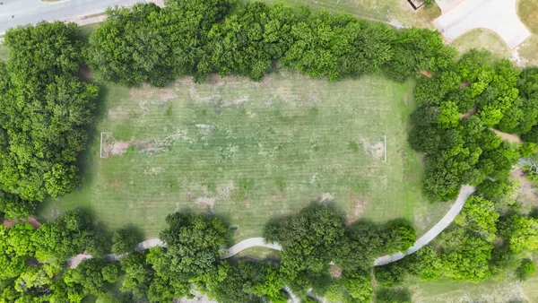 an aerial view of lake residential houses with outdoor space
