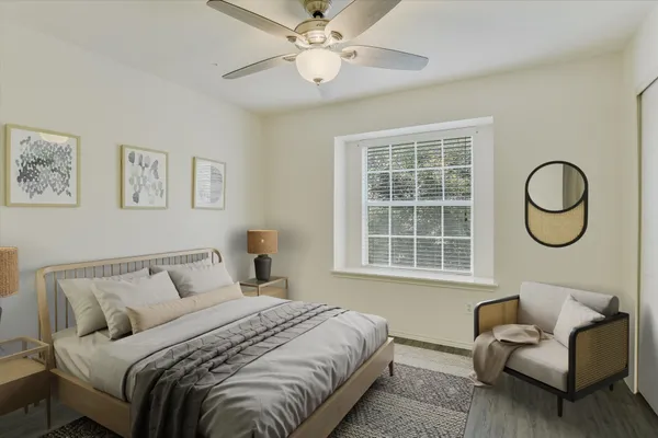 a living room with furniture and a window