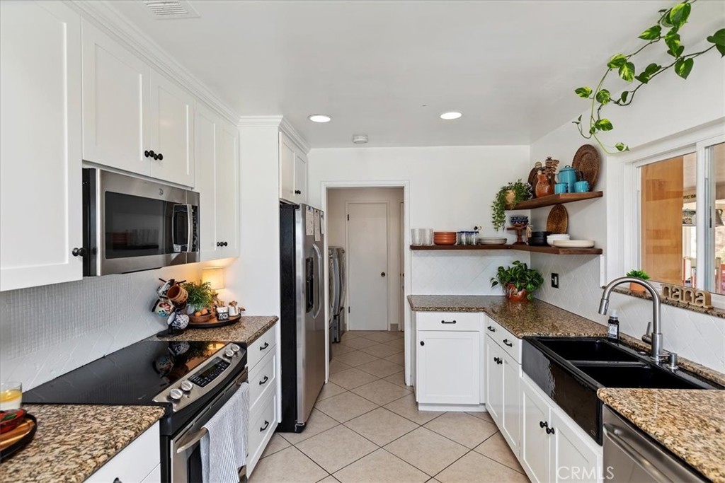 20620 Hill Top Drive Riverside, CA 92507 - Photo 14 of 46 Kitchen with view towards laundry room