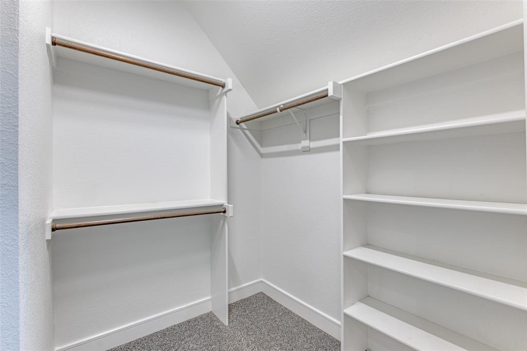5073 Gaston Avenue, Unit 401 Dallas, TX 75214 - Photo 19 of 26 a view of an empty walk in closet
