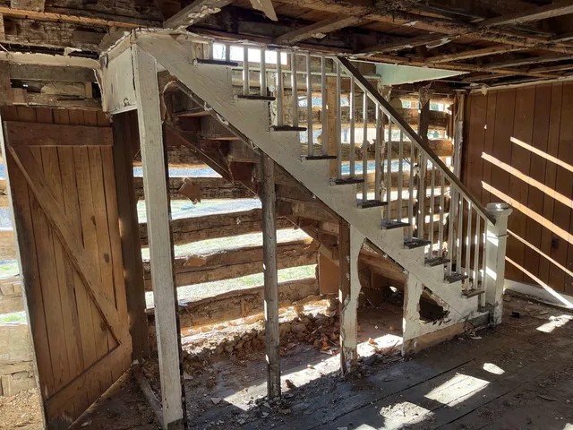 a view of a porch with a door and a porch