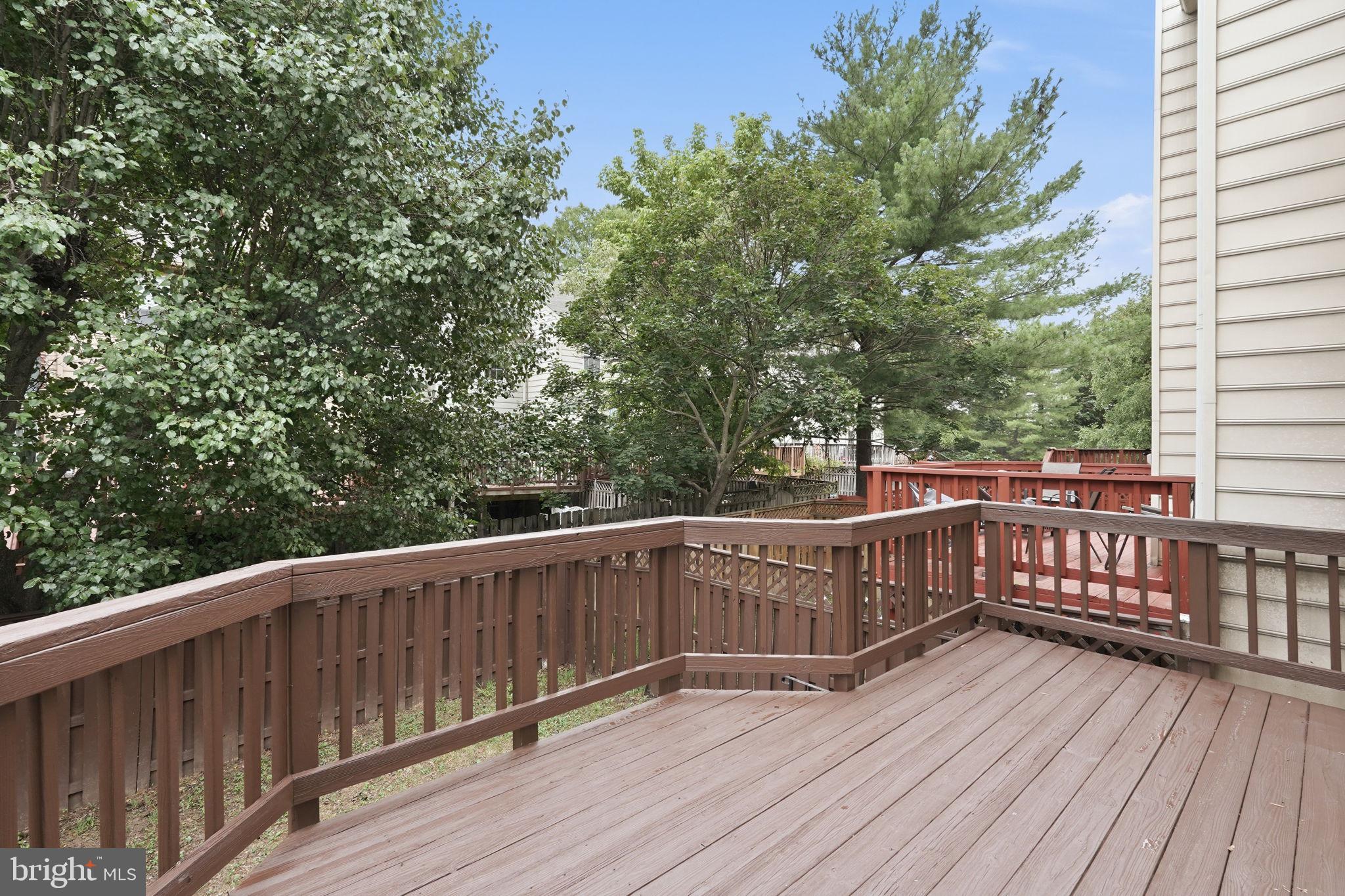 6010 Bingley Road Alexandria, VA 22315 - Photo 42 of 50 a view of deck with wooden floor and fence