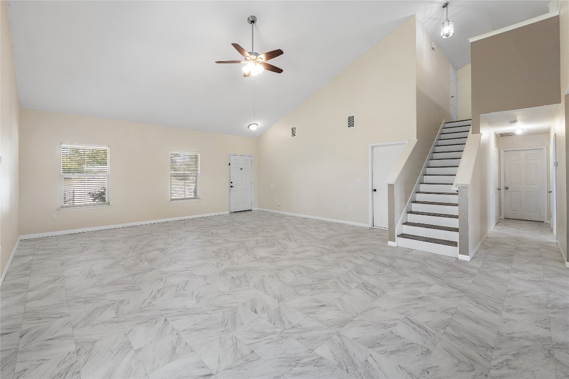 18436 Weatherby Lane Elgin, TX 78621 - Photo 7 of 23 a view of an empty room with a window