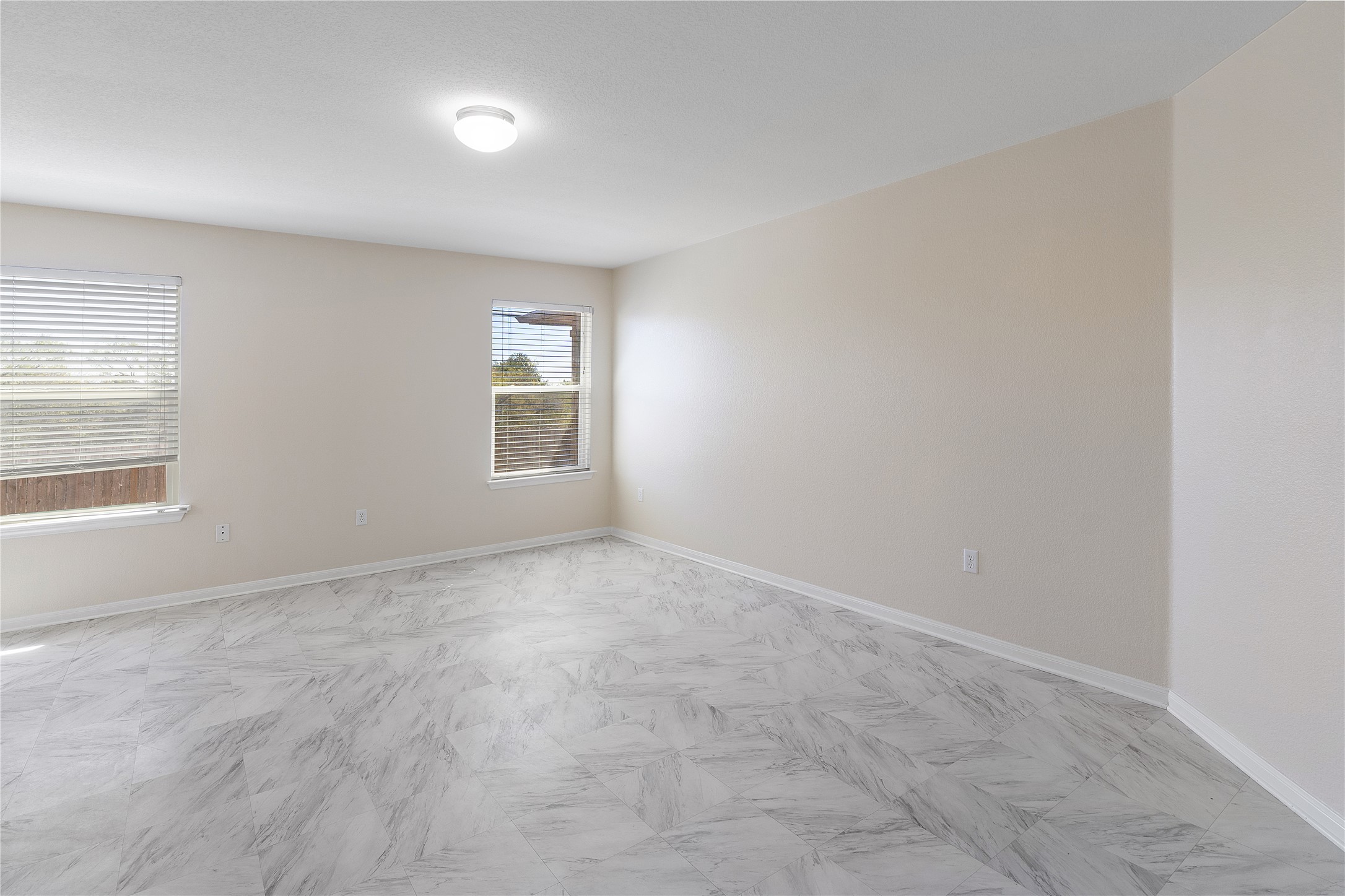 18436 Weatherby Lane Elgin, TX 78621 - Photo 8 of 23 Empty room featuring baseboards