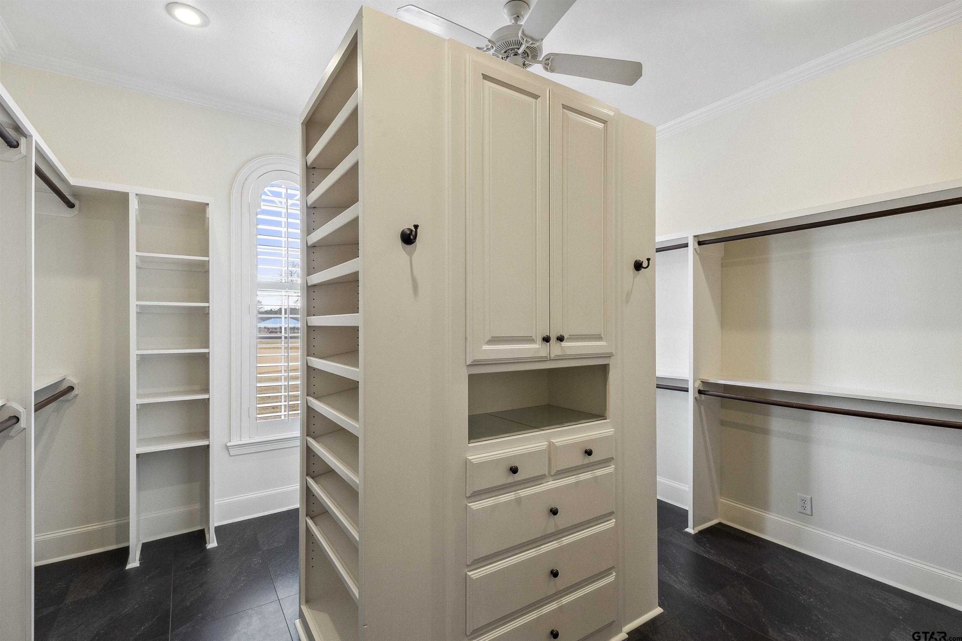 17729 Southpoint Road Whitehouse, TX 75791 - Photo 26 of 48 a view of walk in closet with empty racks