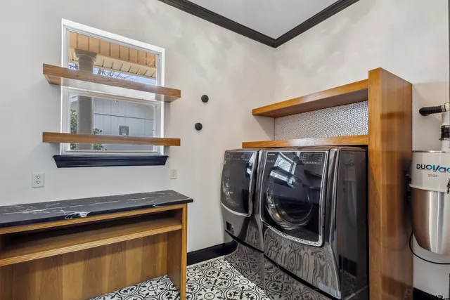a utility room with dryer and washer