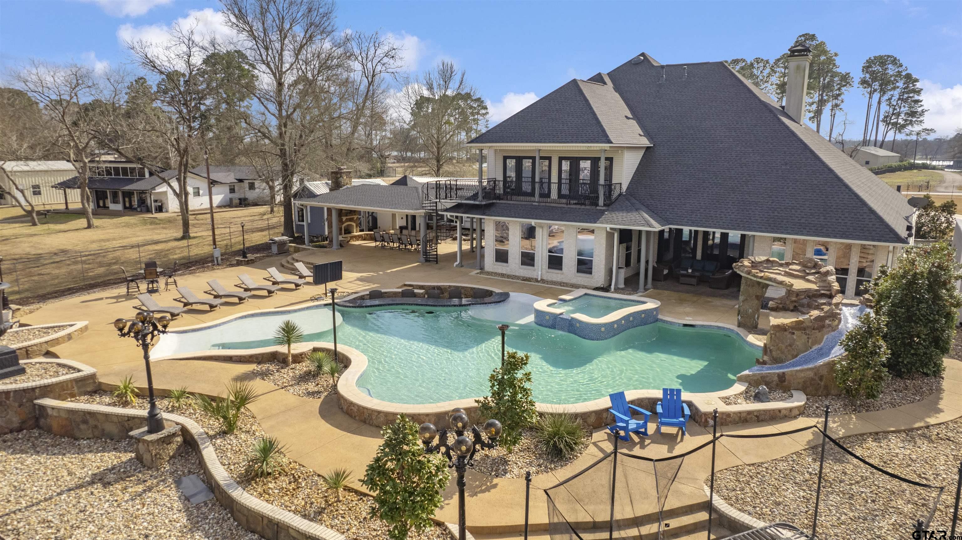 17729 Southpoint Road Whitehouse, TX 75791 - Photo 4 of 48 a view of a house with swimming pool and furniture