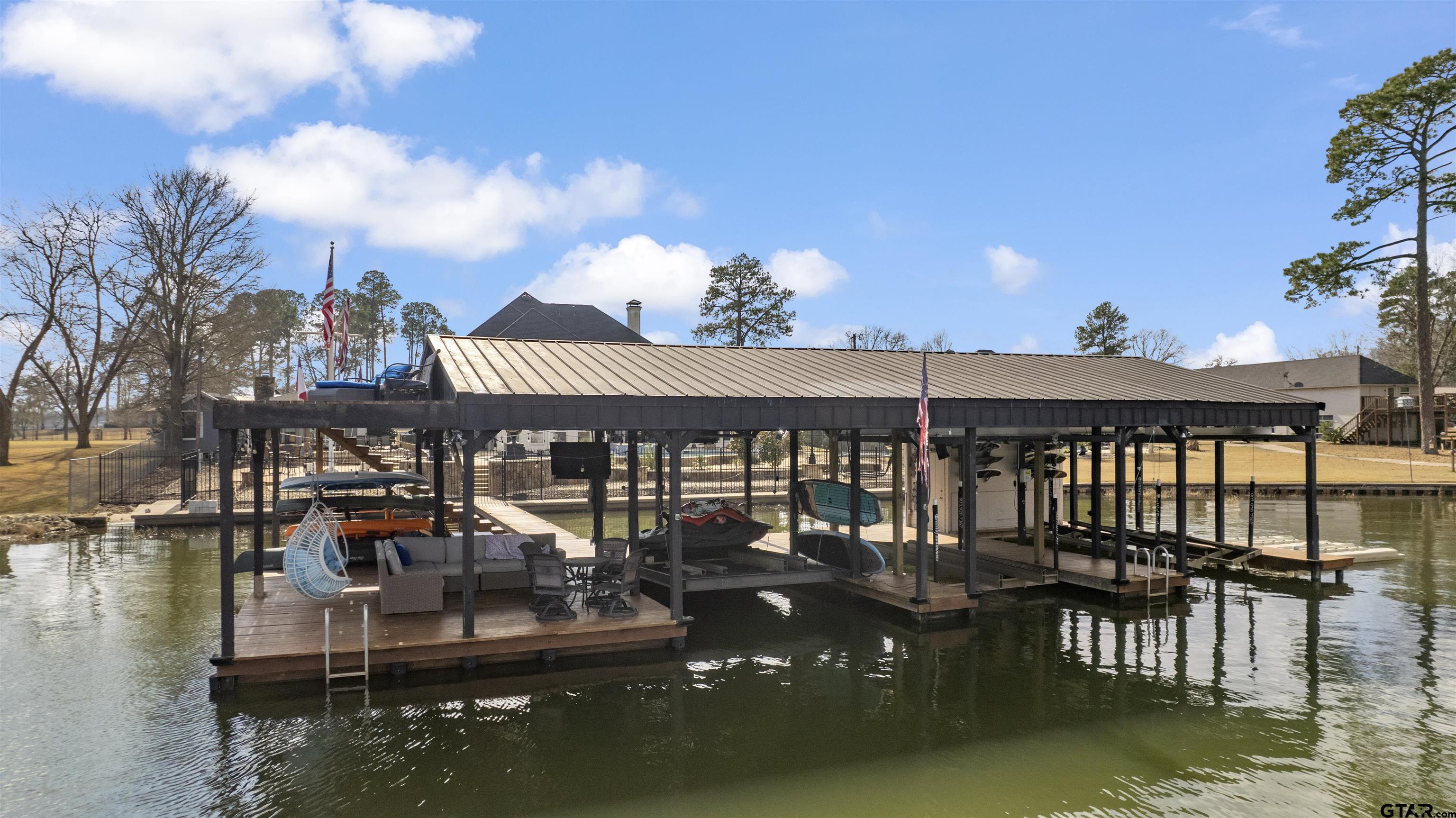 17729 Southpoint Road Whitehouse, TX 75791 - Photo 48 of 48 a view of house with swimming pool and lake view