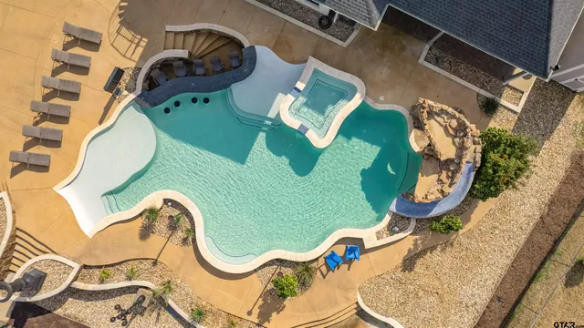 an aerial view of a swimming pool