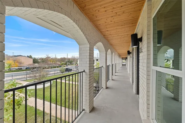 a view of a balcony with city view