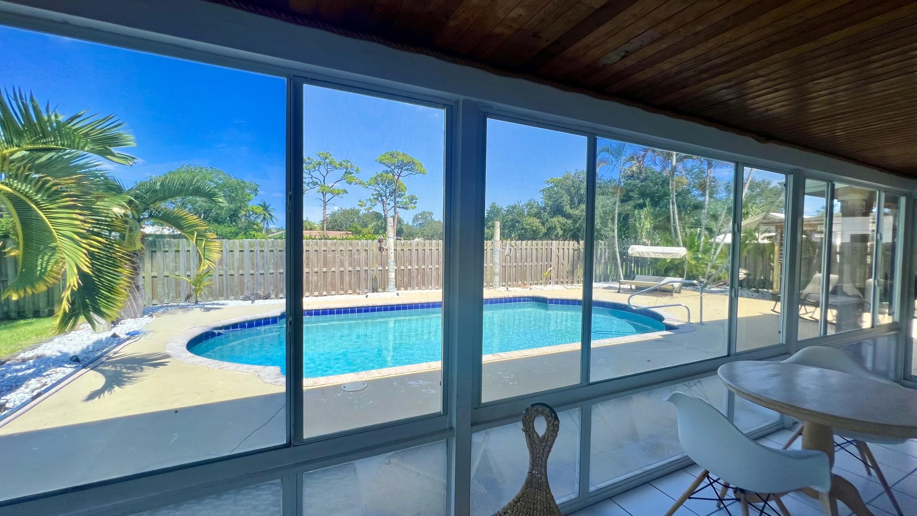 1224 Southwest 16th Avenue Boca Raton, FL 33486 - Photo 3 of 48 Sunroom view of Pool