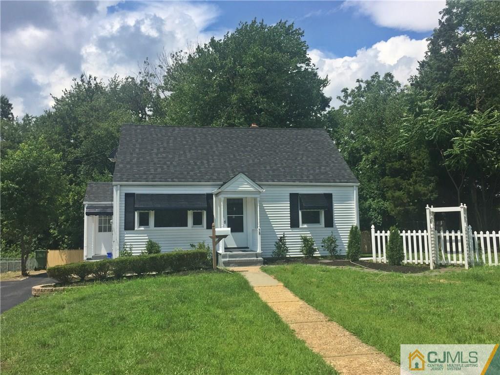 38 Sine Road Edison, NJ 08817 - Photo 2 of 15 a front view of house with yard and green space