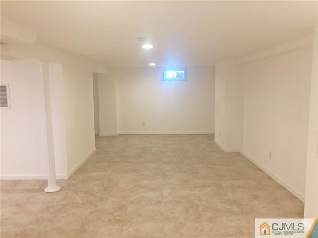 38 Sine Road Edison, NJ 08817 - Photo 14 of 15 an empty room with windows