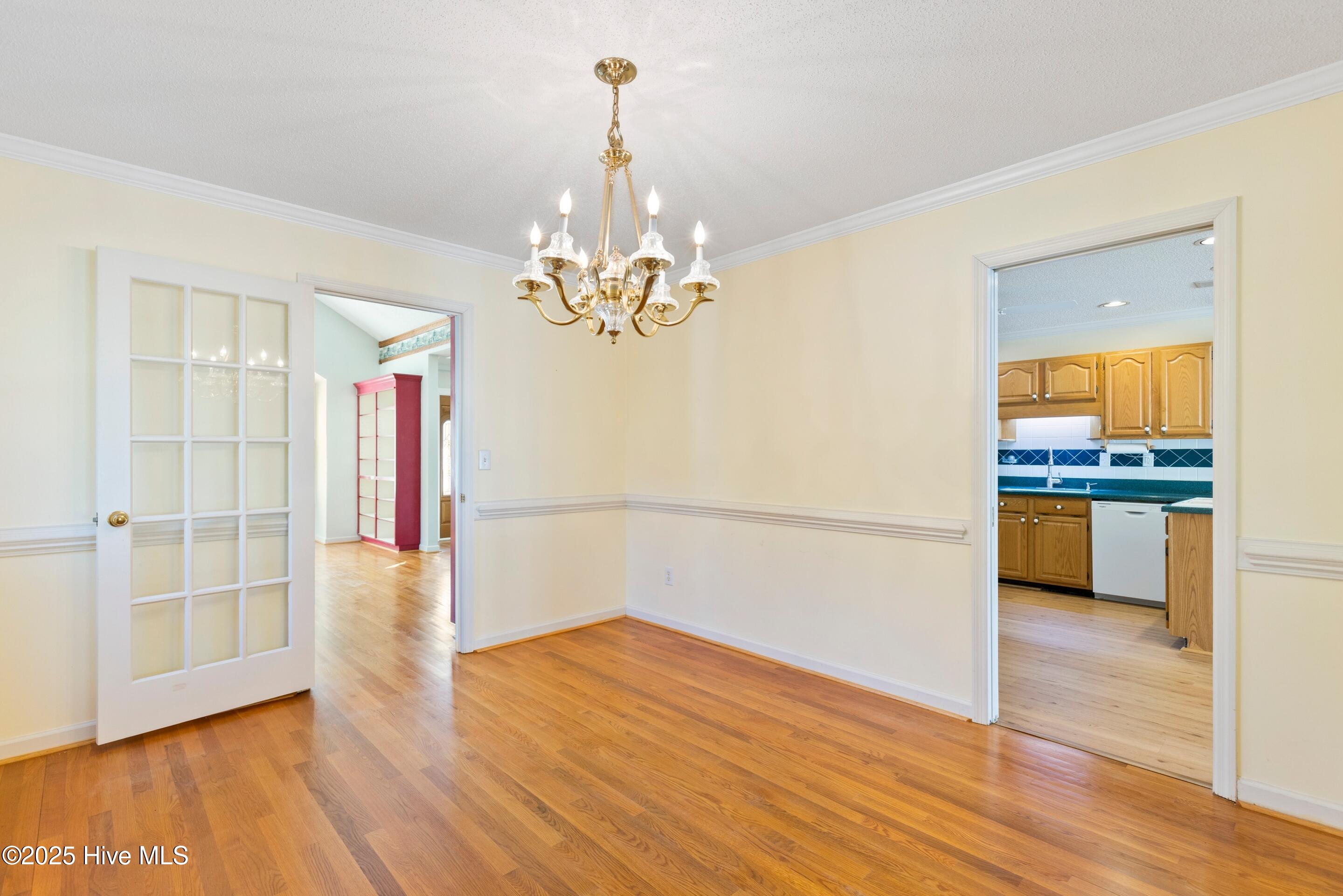 1501 Field View Road Wilmington, NC 28411 - Photo 11 of 57 Formal dining room or office with pocket door and glass door to the formal living room.